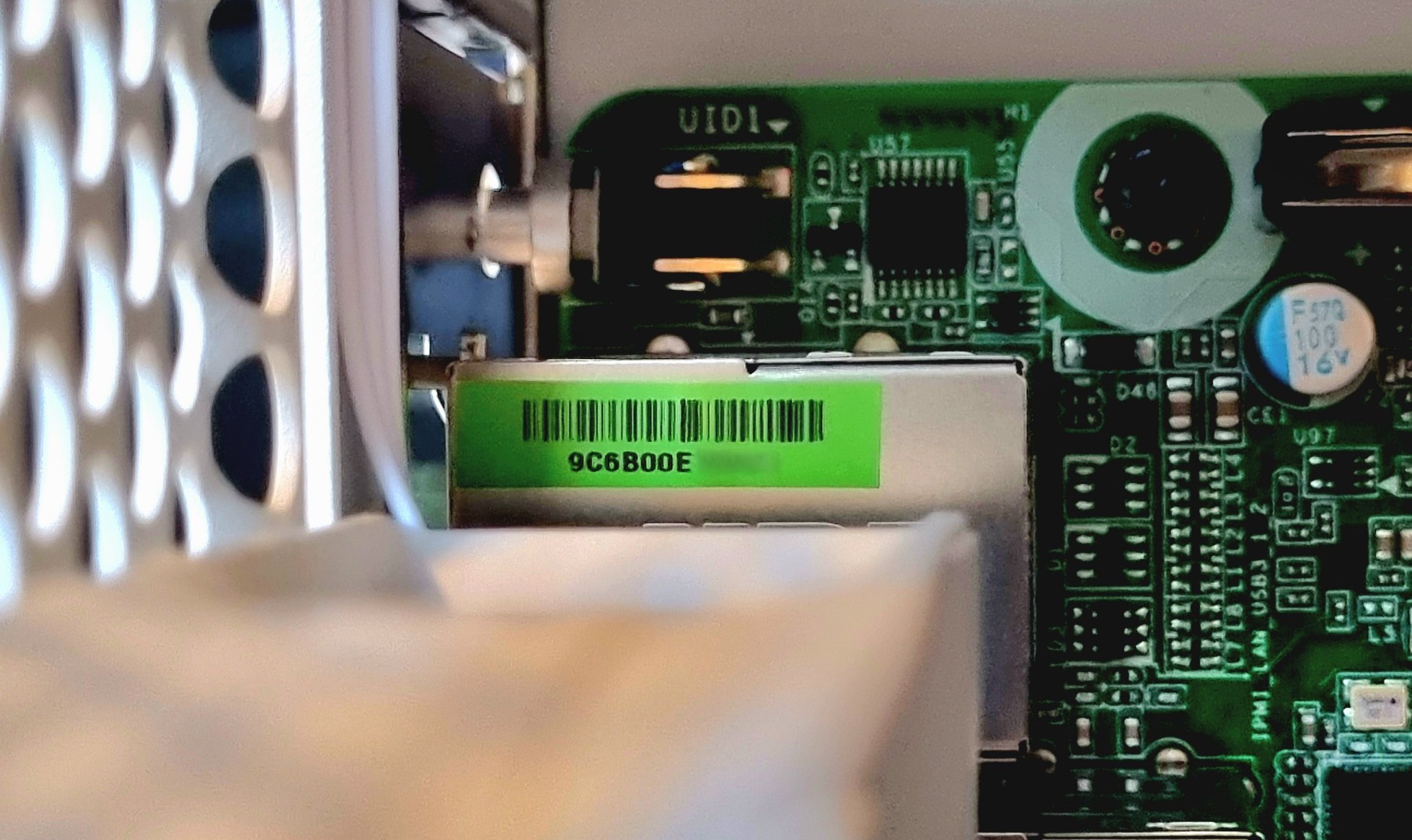 Green sticker with a MAC